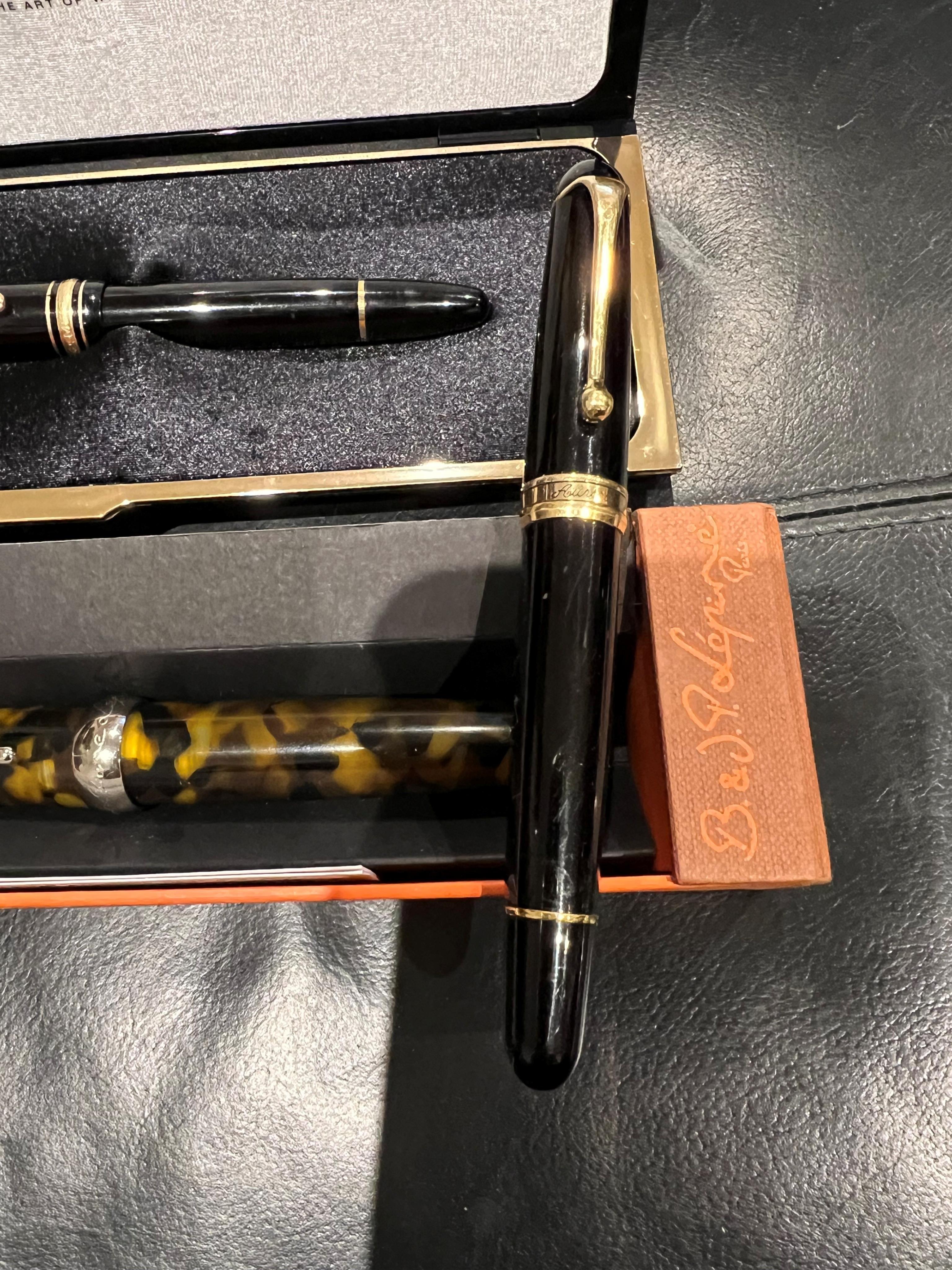 A Montblanc 146 vintage fountain pen, in original case, along with Aurora fountain pen and two others (4)